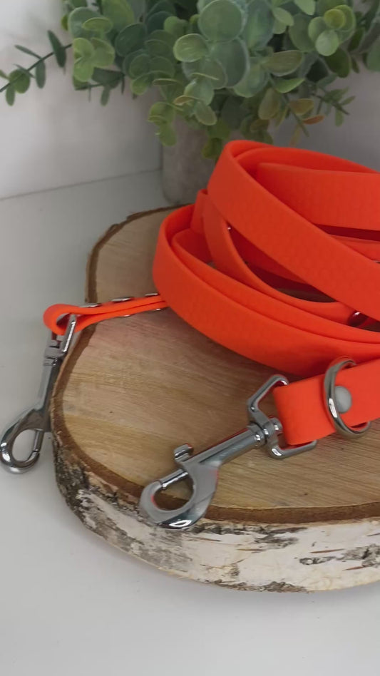 Laisse Mains Libres en Hexa Souple orange fluo